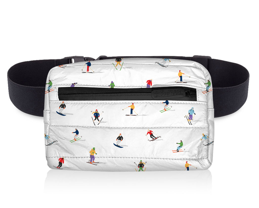 http://www.hilovetravel.com/cdn/shop/files/puffer-fanny-pack-dancing-skiers_1024x.jpg?v=1687380058