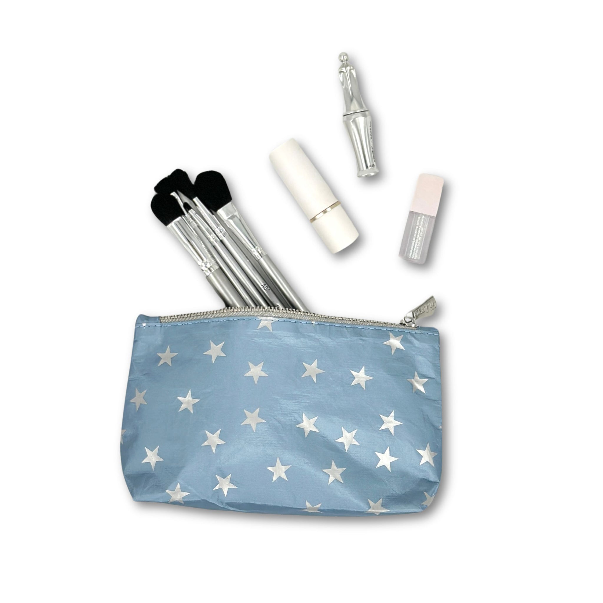 Mini shimmer ice blue with silver stars pouch with makeup brushes