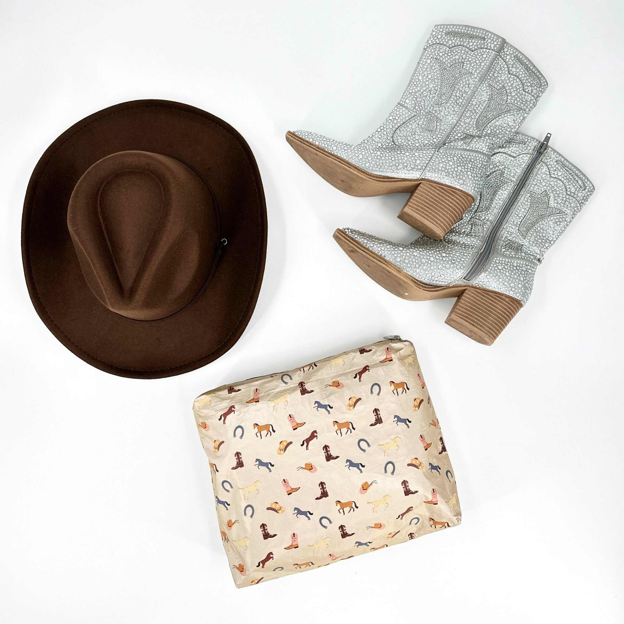 Shimmer beige equestrian zipper pouch with brown cowboy hat and rhinestone cowgirl boots