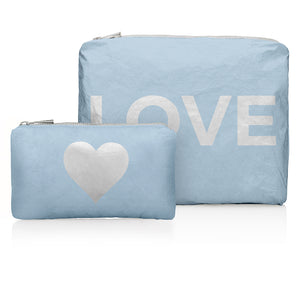 Set of two zipper pouch set in ice blue with silver "love" and heart emblem