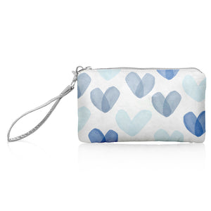 White zip wristlet with shades of blue hearts and silver wrist strap