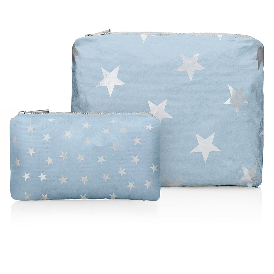 Medium and mini sized zipper pouches in ice blue with silver stars