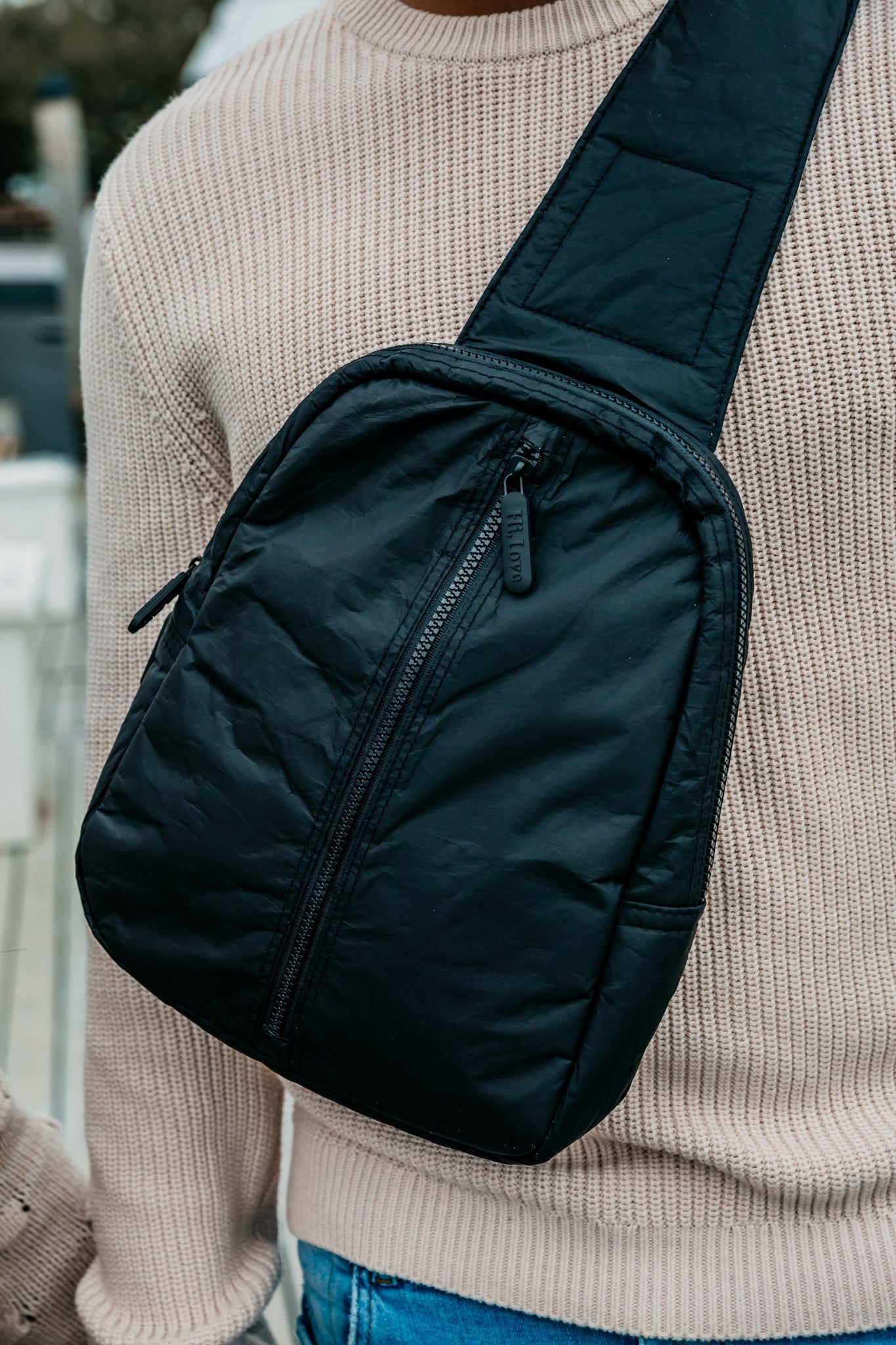 Crossbody Backpack with Outside Zipper Front Pocket in Black